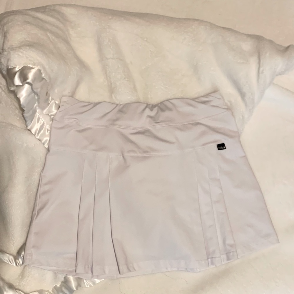 White athletic skirt with built in shorts: size M